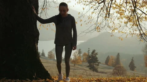Tired female runner taking a break. Sporty women resting on running. Stock Footage 56917697