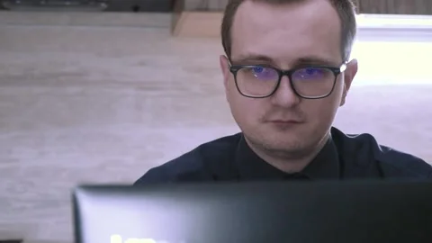 Tired freelancer working at night at the computer Stock Footage 201612261