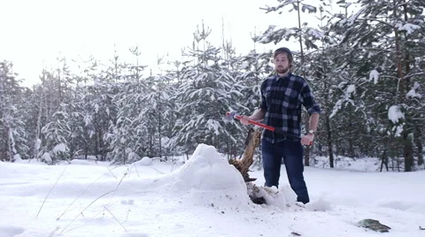 Tired lumberjack standing in winter forest, steam coming out of his mouth Stock Footage 60053903