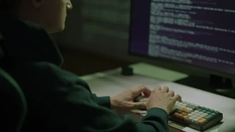Tired male programmer experiencing stress and professional burnout, holding head Stock Footage 323451107