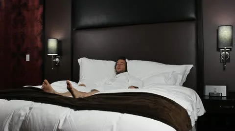 Tired man in bed - HD Stock Footage 12233986