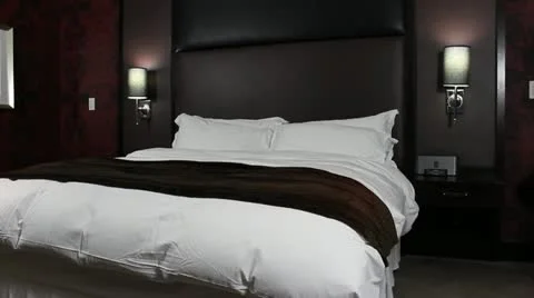 Tired man falls on bed V1 - HD Stock Footage 12232324