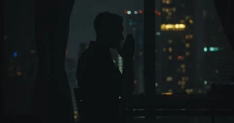 Tired man interpreting financial data after dark, financier refining profit Stock Footage 312122148