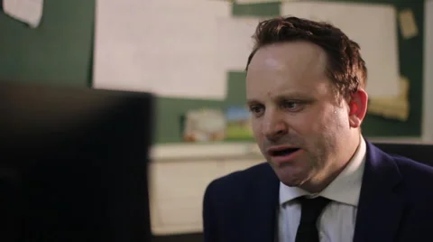 Tired man in office Stock Footage 61949143