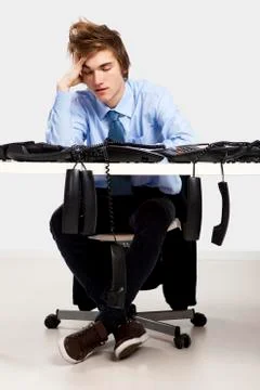 Tired man in the office Stock Photos