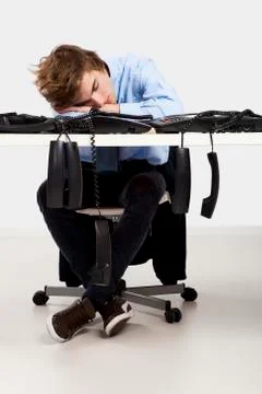 Tired man in the office Stock Photos