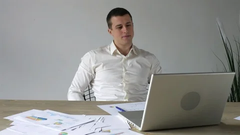 Tired man resting in the workplace Video stock 107942274