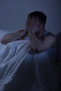 Tired man with sleep problems Stock Photos