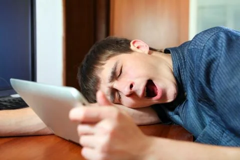 Tired Man with Tablet Foto stock