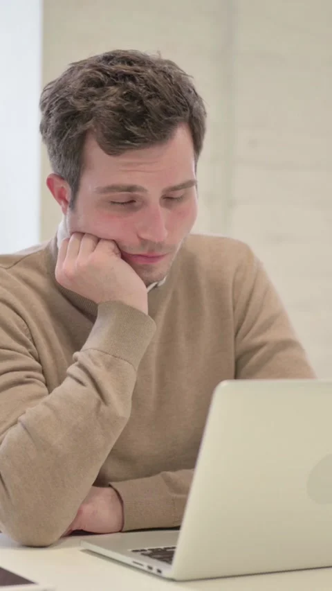 Tired Man taking Nap While Sitting in Office with Laptop, Vertical Video Stock Footage 337351292