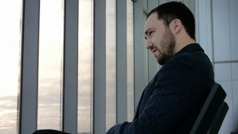 Tired man waiting for delayed flight. Stock-Footage 124370885