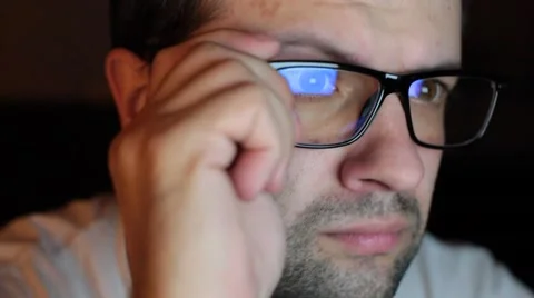 Tired man Working On His Computer Stock Footage 51694356