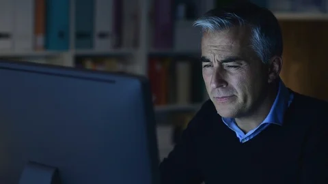 Tired manager working late at night Stock Footage 89197279