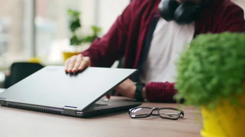 Tired office worker finishes work, takes a break, closes laptop. Overworked Stock Footage 217733407