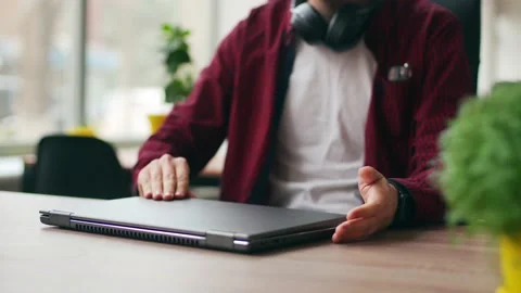 Tired office worker finishes work, takes a break, closes laptop. Overworked Stock Footage 221091871