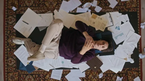 Tired Office Worker Playing with Baseball at Cluttered Desk Stock Footage 342064547