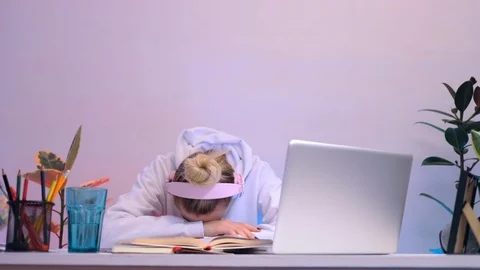 Tired office worker sleeping on the desk at work chill relax room home loft Stock Footage 113502575
