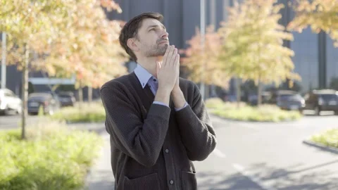 Tired Office Worker in Urban Setting Showing Signs of Stress and Fatigue Stock Footage 293680027