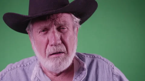 A Tired Old Farmer Lets Out A Sigh Of Relief (Green Screen). Stock Footage 45738080