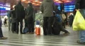 Tired people expecting their flight at the airport, traveling, slow-motion HD Footage