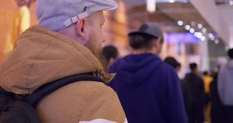 Tired people in long queue waiting their turn to buy stuff. Dynamic video of Vidéo 246926026