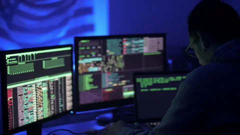 Tired programmer or hacker works at home in quarantine at night. Stock Footage 131164176