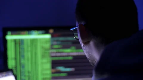 Tired programmer or hacker works at home in quarantine at night. Stock-Footage 131168759