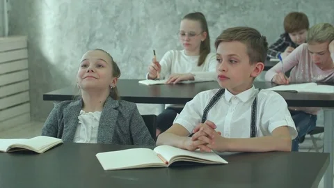 Tired pupils during class in school Vídeos de archivo 77739553