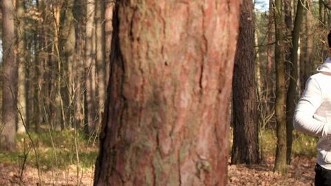 Tired runner using a mobile phone during a short break 스톡 동영상 102833113