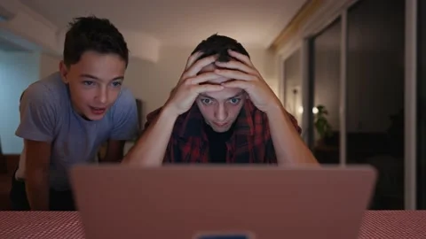 Tired sad irritated stressed out father works remotely from home. Mother and Stock-Footage 223859945