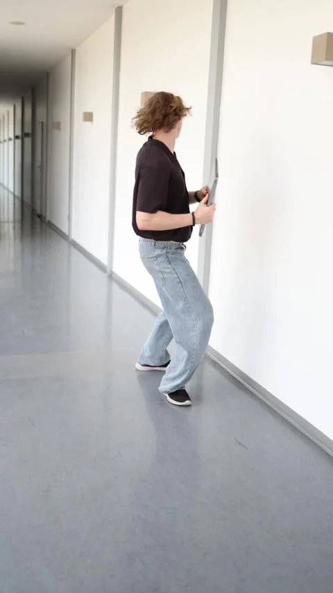 Tired schoolboy studies while walking before an important exam Stock Footage 337851679