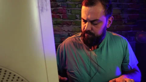Tired Software Programmer Working on Desktop Computer From 1990's in Home Stock Footage 301534819