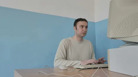 Tired Stressed Man Working At Retro Computer.  스톡 동영상 126118141