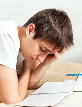 Tired Student working Stock Photos