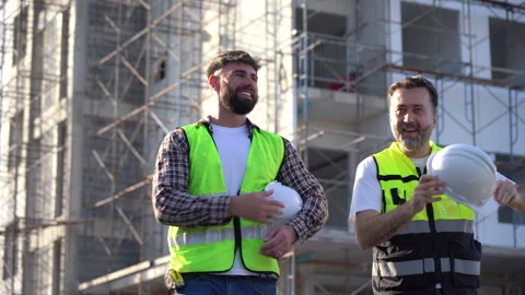 Tired team of Construction workers Senior architect or civil engineer and f.. Stock Footage 262162390