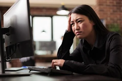 Tired tech engineer was struggling to keep up with the demands Stock Photos