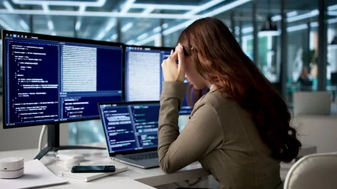 Tired Web Developer Sits At Desk Coding Stock Footage 334531904