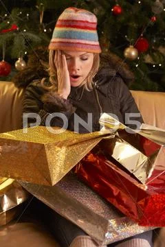 Tired Woman Returning After Christmas Shopping Trip Stock Photos
