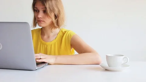 Tired woman using computer Stock Footage 113861257