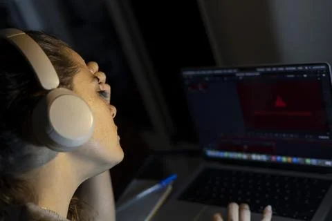 Tired woman working on a computer with an error on the screen Stock Photos