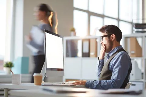 Tired at work Foto stock