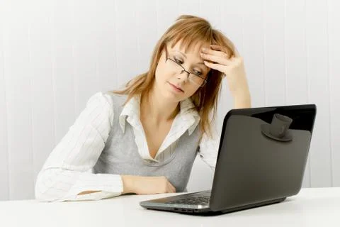 Tired worker in the office Stock Photos
