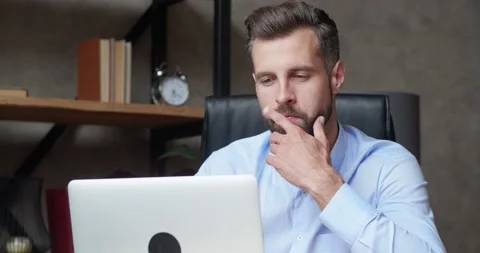 Tired worker overworked on computer. Frustrated businessman working alone Stock Footage 159753441