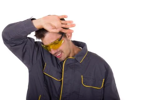 Tired working man Stock Photos