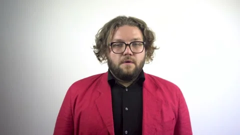 Tired young man in a red jacket. Depressed man. Stock-Footage 137045844
