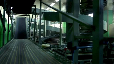 Tires are falling to the conveyor Stock Footage 74911684