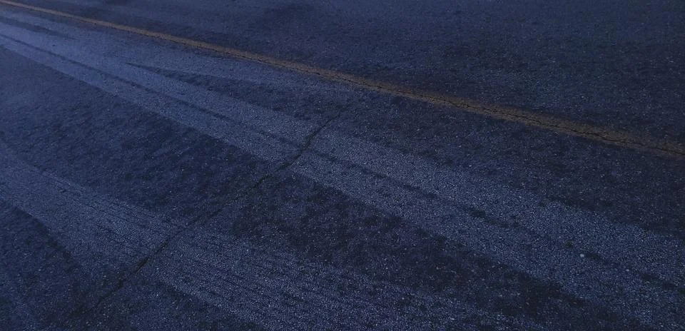 Tires Marks on Pavement Stock Photos