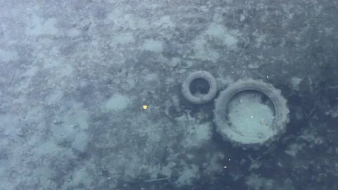 Tires under water Stock Footage 80854887