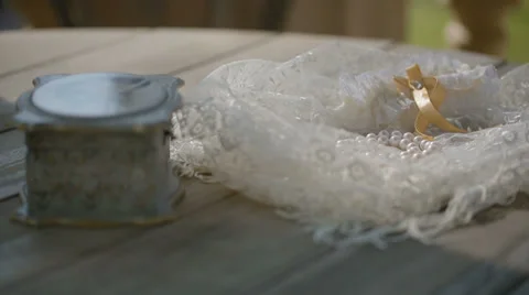 Tissue box and pearls on the table shot with slider Stock Footage 38615198