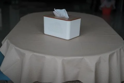 Tissue Box on a Table With Beige Tablecloth Stock Photos